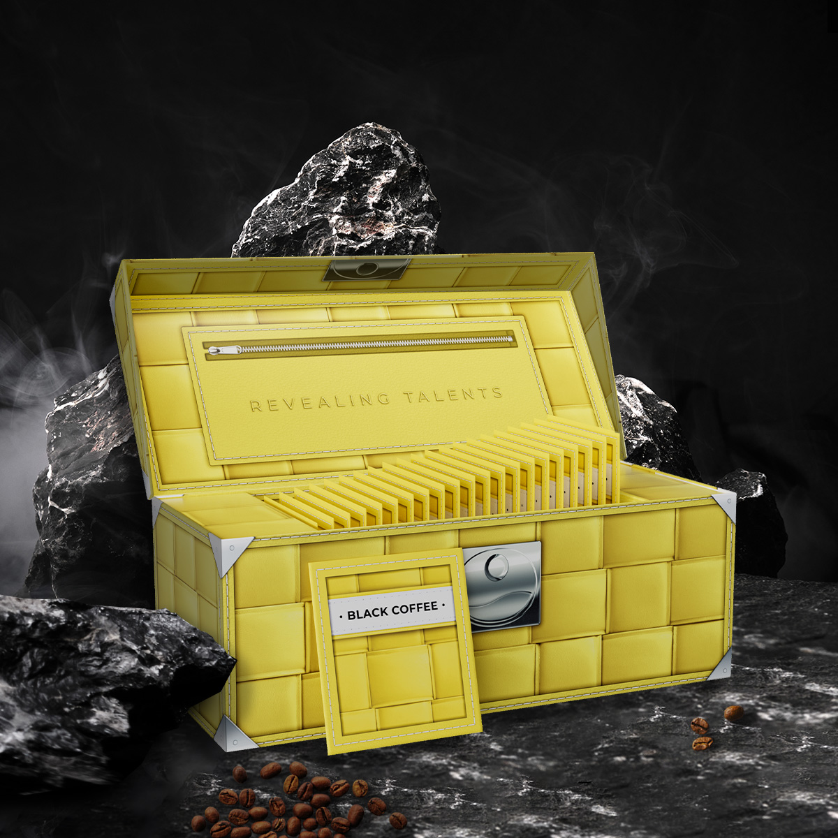 open yellow box of black coffee product on the rocks